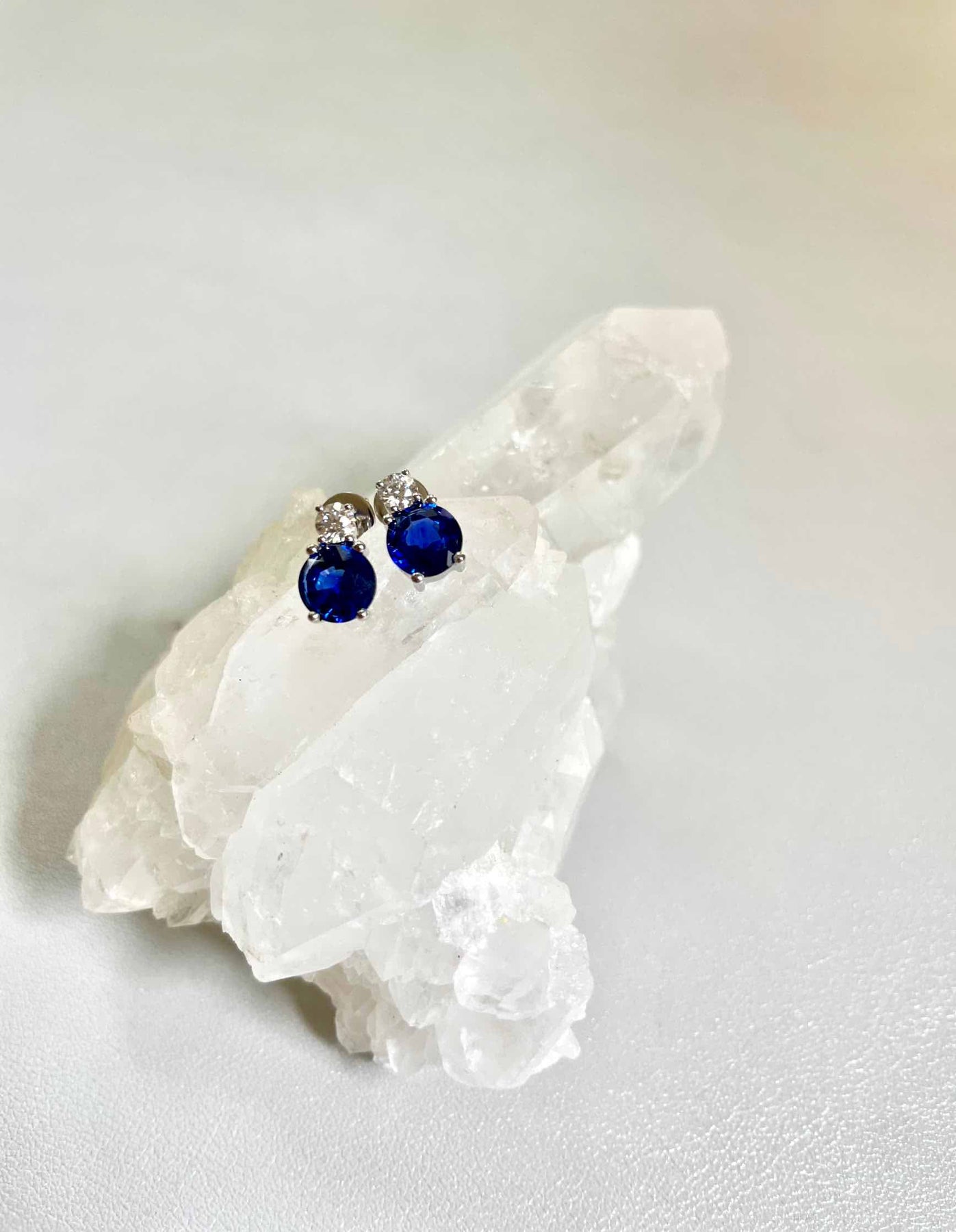 Six Petal Diamond and Sapphire Flower Stud Earrings | Angara